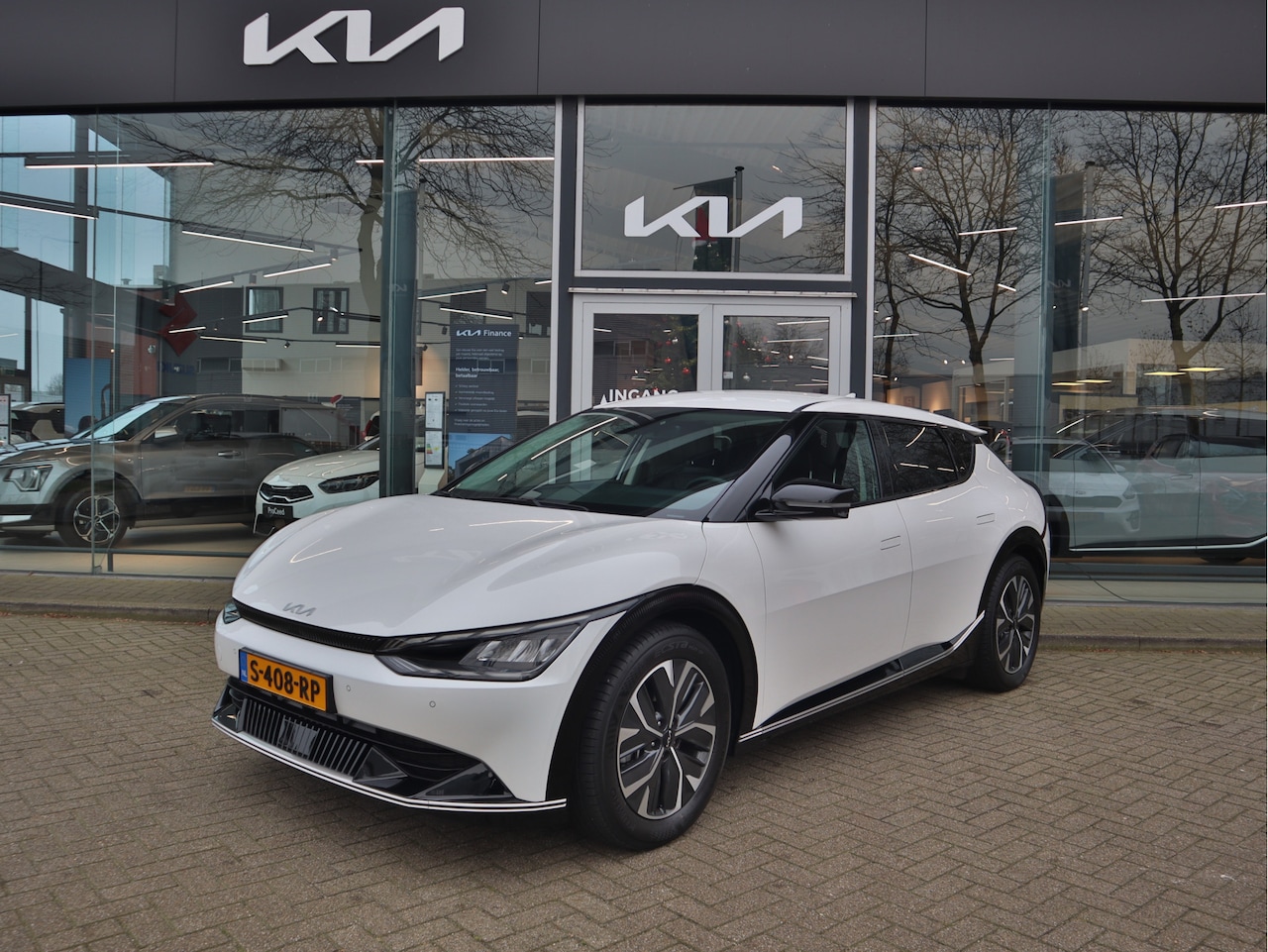 Kia EV6 - Plus RWD 77.4 kWh Navi+BT+Cam Adapt.Cr.Control Leder+Stoelvew. PDC Trekhaak 7 jr. Garantie - AutoWereld.nl