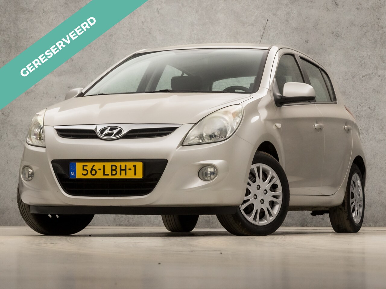 Hyundai i20 - 1.4i Dynamic Sport (NAVIGATIE, RADIO, NAP, AIRCO, SPORTSTOELEN, ELEK PAKKET, ARMSTEUN, STU - AutoWereld.nl