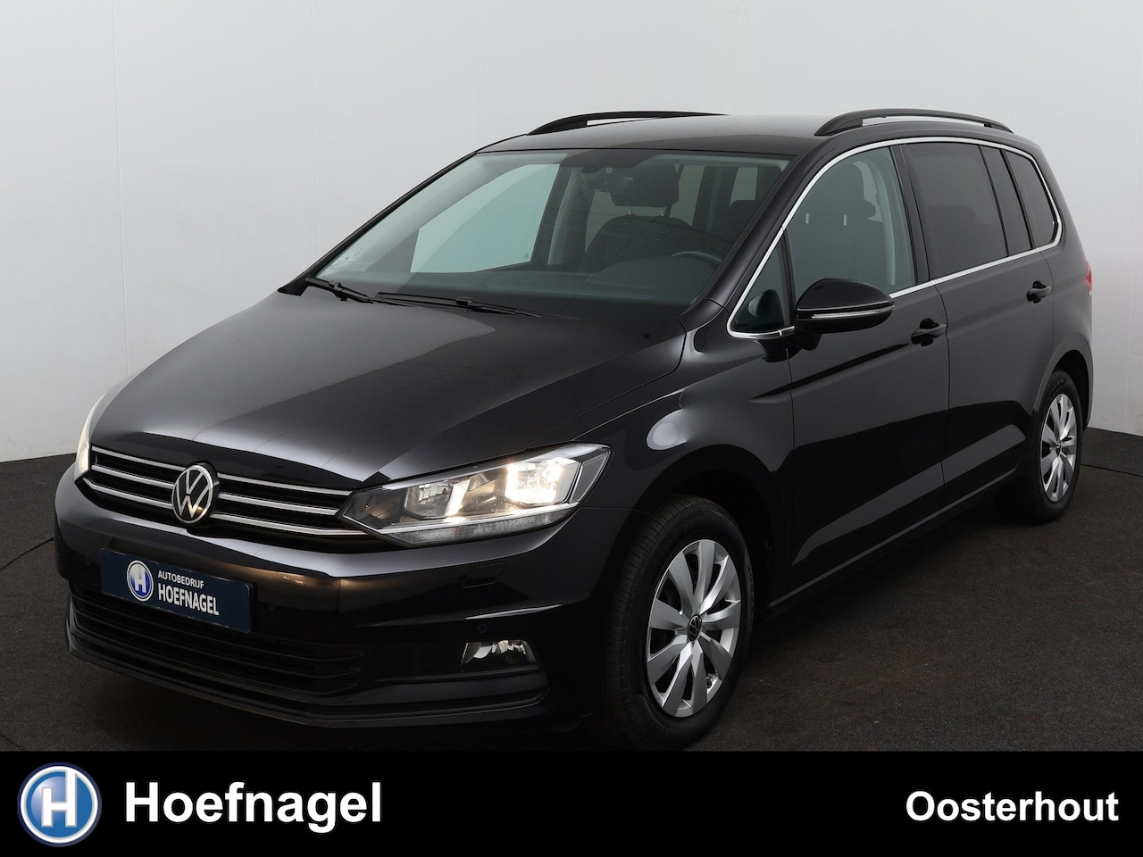 Volkswagen Touran - 1.5 TSI Comfort Line Automaat | Stoelverwarming | Adaptive Cruise Control | Parkeersensore - AutoWereld.nl