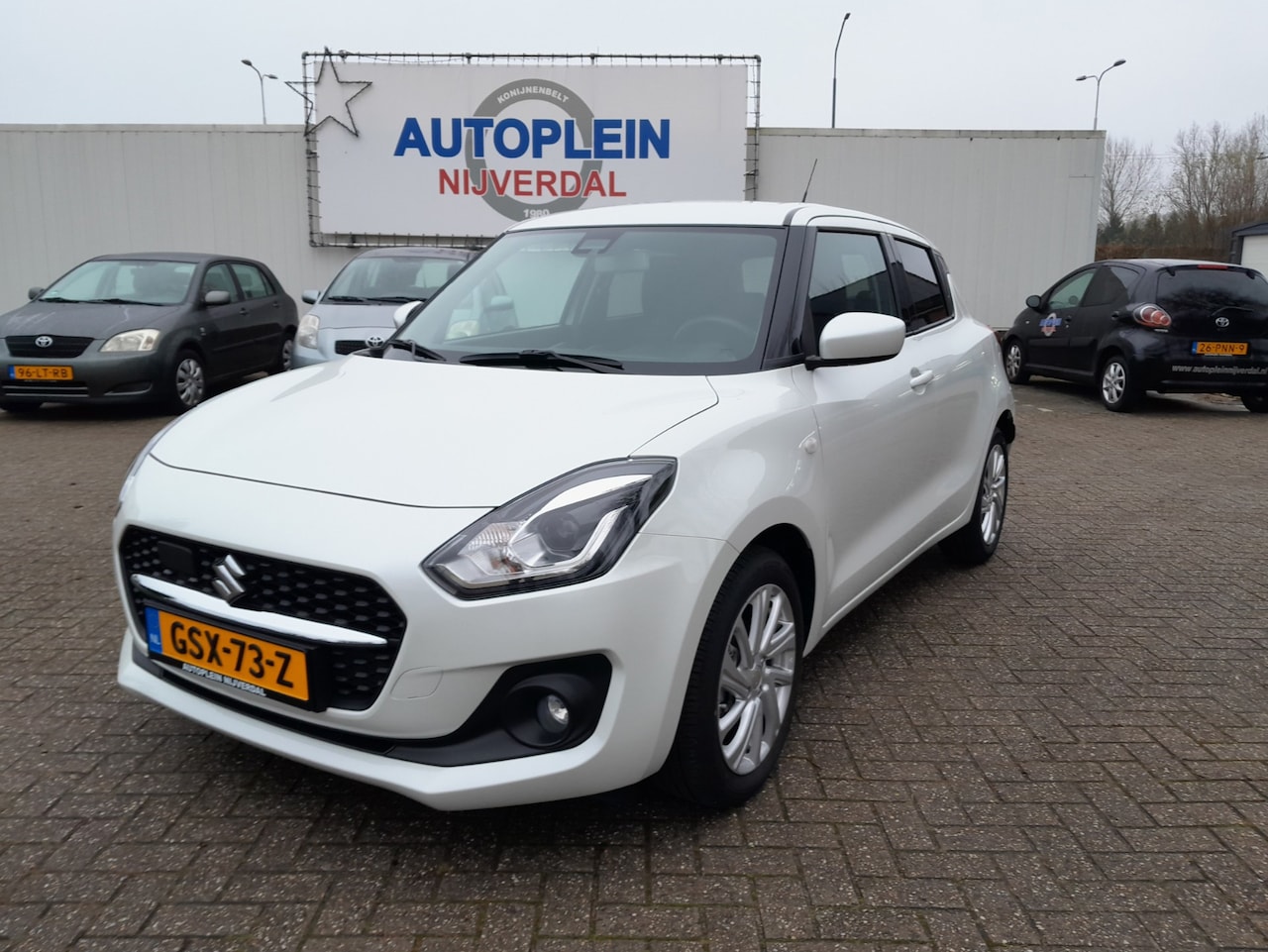 Suzuki Swift - 1.2 Select Smart Hybrid keurig nette auto in het parelmoer wit! - AutoWereld.nl