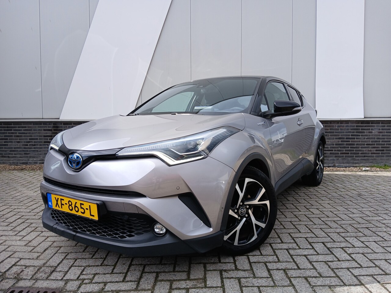 Toyota C-HR - 1.8 Hybrid Bi-Tone Plus | Blind Spot | Navi | PDC v+a | - AutoWereld.nl