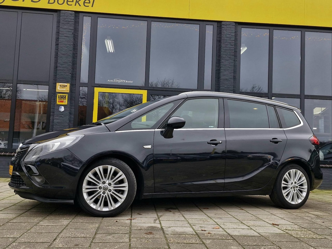 Opel Zafira Tourer - 1.4 Blitz 7persoons |Stuurverwarming | Stoelverwarming | Parkeer Sensoren voor en achter | - AutoWereld.nl