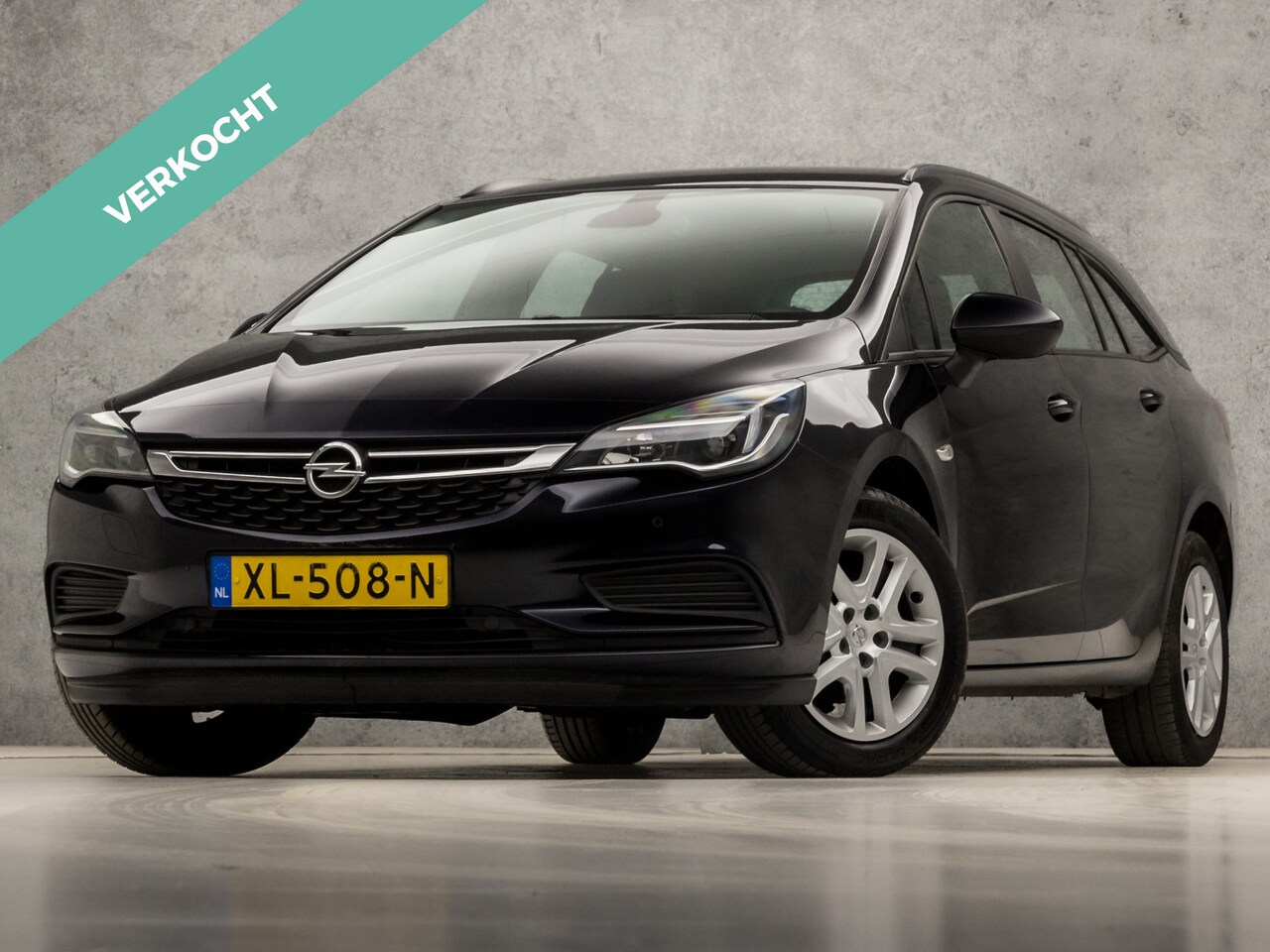 Opel Astra Sports Tourer - 1.0 Sport (APPLE CARPLAY, GROOT NAVI, CRUISE, ELEK PAKKET, ARMSTEUN, SPORTSTOELEN, PARKEER - AutoWereld.nl