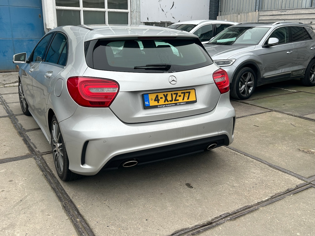 Mercedes-Benz A-klasse - 180 Ambition Comfort AUT AMG SPORTPAKKET LED LEDER PANORAMA - AutoWereld.nl