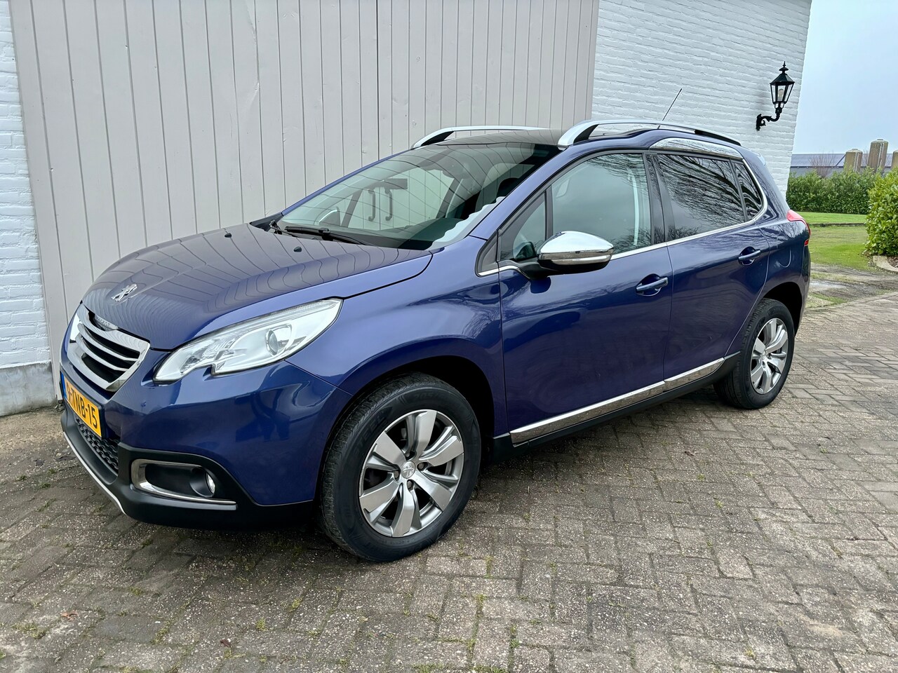 Peugeot 2008 - 1.2 VTi Allure Pack - AutoWereld.nl