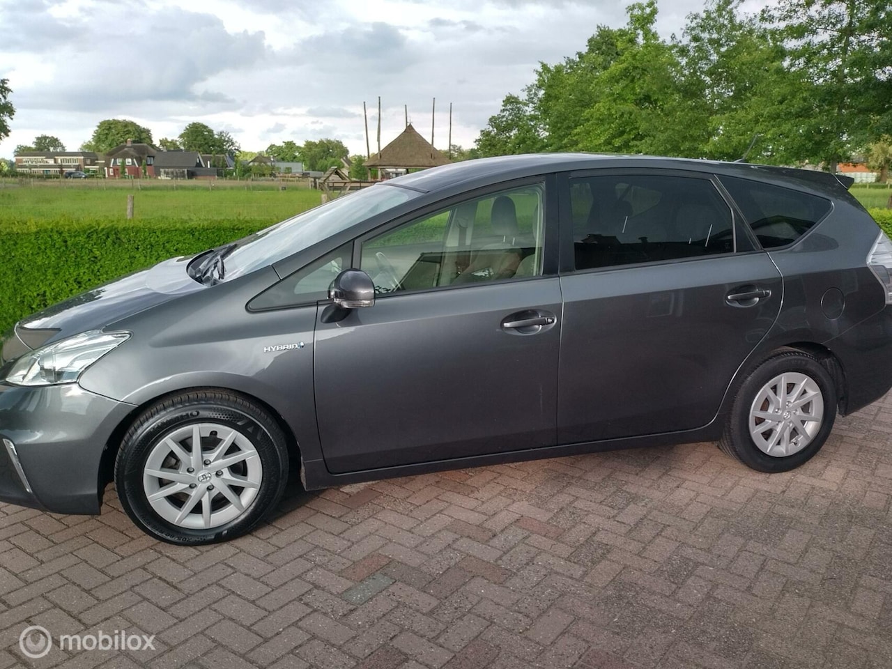 Toyota Prius Wagon - 1.8 Comfort 7-persoons - AutoWereld.nl