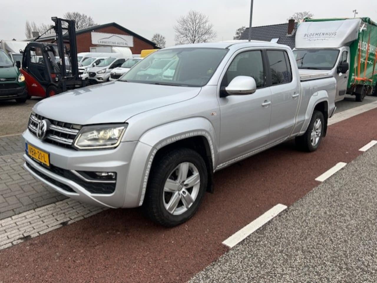 Volkswagen Amarok - 3.0 TDI 4Motion DC 5 PERS. Highline AUTOM. NAVI KLIMA LEER - AutoWereld.nl