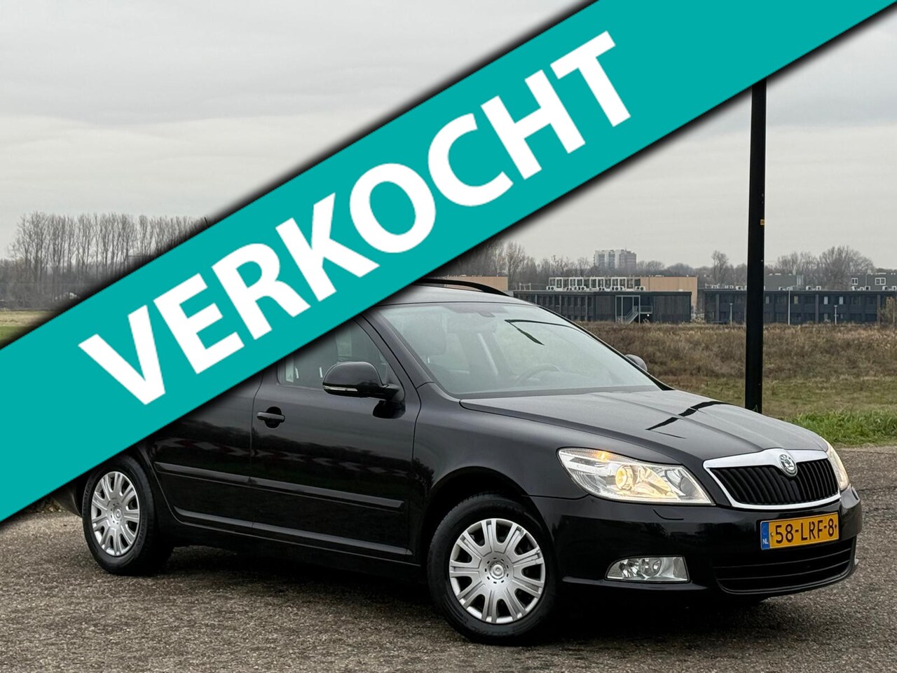 Skoda Octavia Combi - 1.2 TSI Ambition Airco|Cruise|Xenon|Trekhaak|Nap|Boekjes - AutoWereld.nl