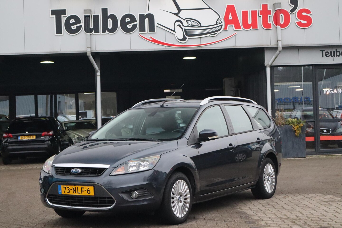 Ford Focus Wagon - 1.8 Limited Navigatie, Climate control, Radio cd speler, Cruise control, Parkeersensoren, - AutoWereld.nl