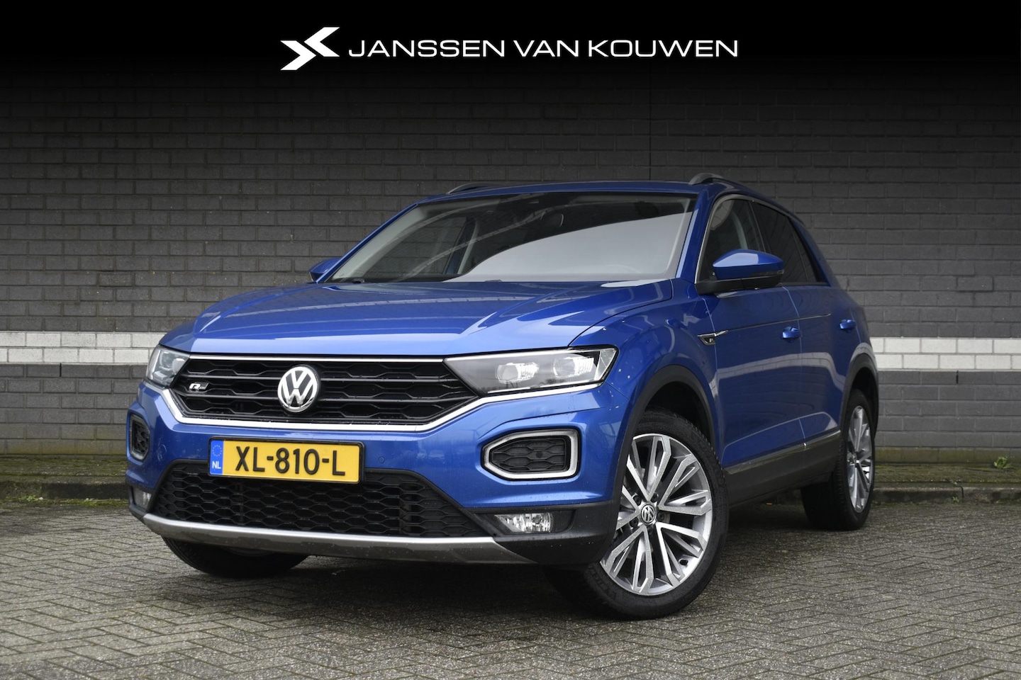 Volkswagen T-Roc - 1.5 TSI Sport / Pano / Navi / LED / PDC - AutoWereld.nl