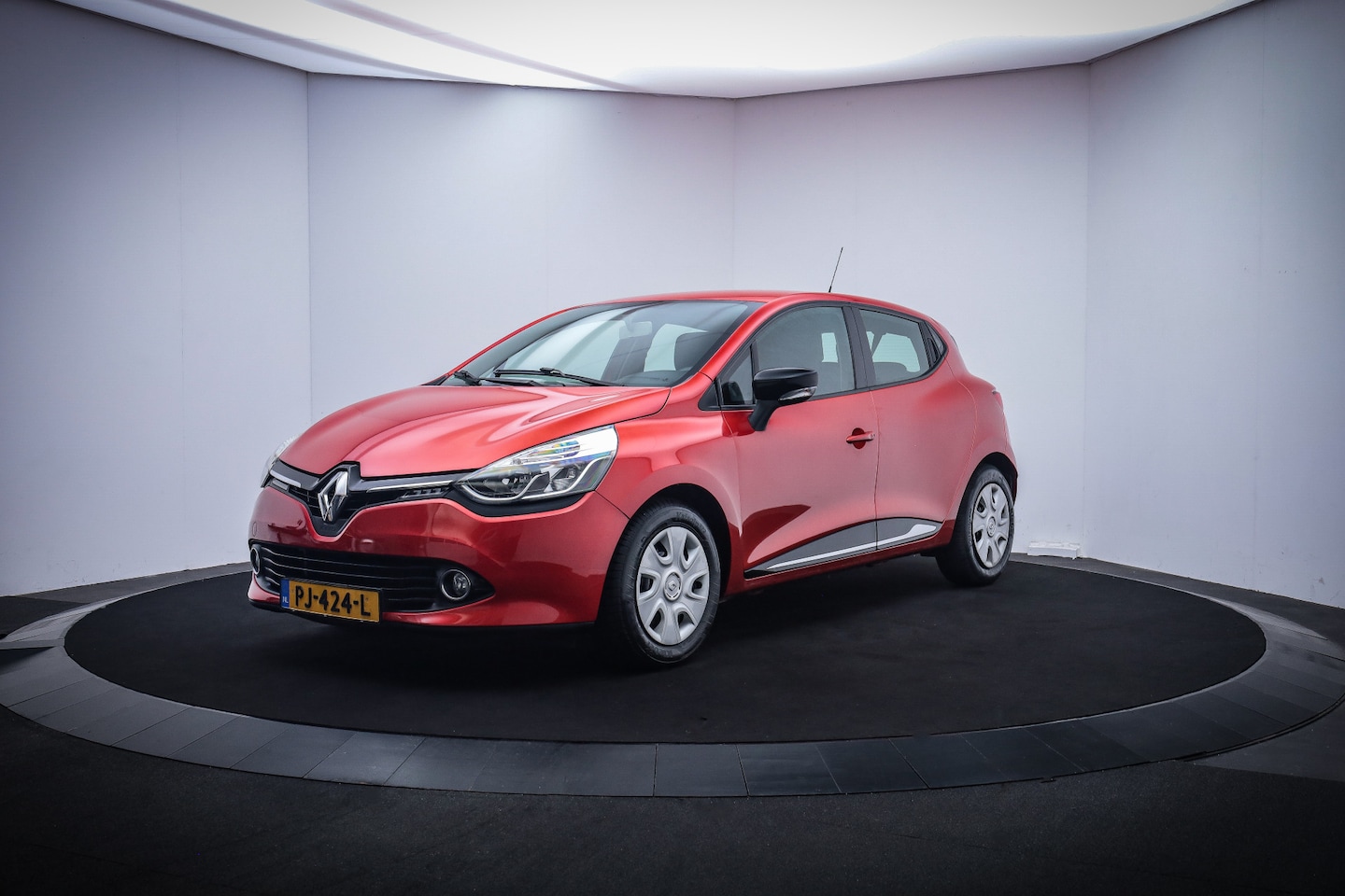 Renault Clio - 1.2-16V Collection NAVI/AIRCO/CRUISE/BLUETOOTH - AutoWereld.nl