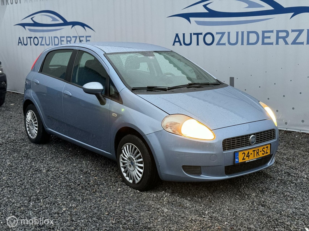 Fiat Grande Punto - 1.4 Edizione Blue & Me 1.4 Edizione Blue & Me - AutoWereld.nl