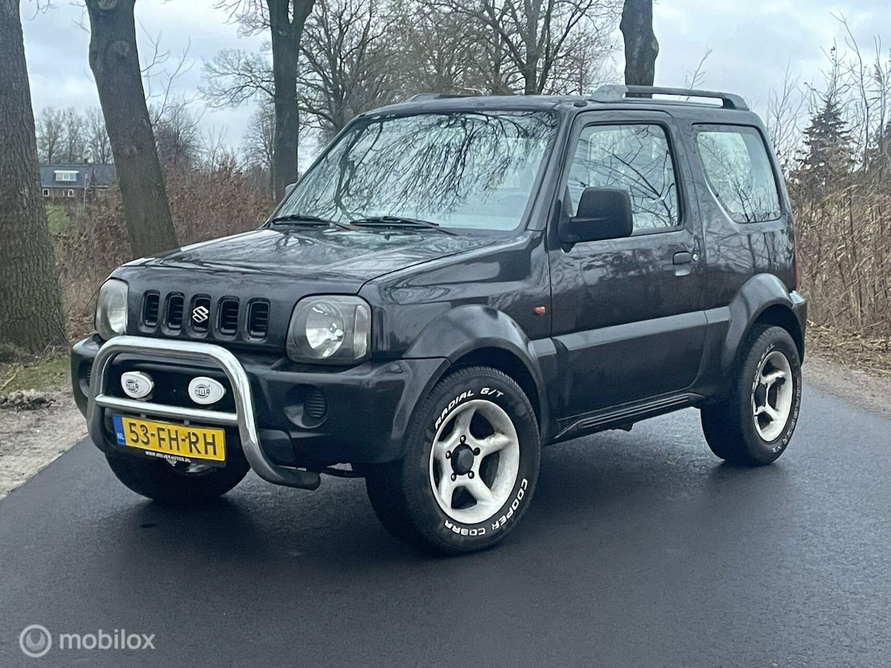 Suzuki Jimny - 1.3 JX 4WD NAP - AutoWereld.nl