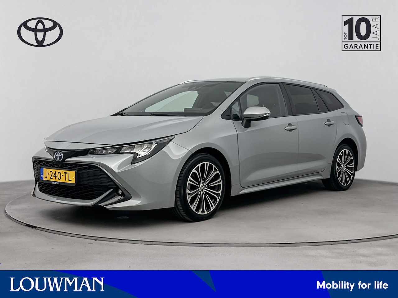 Toyota Corolla Touring Sports - 1.8 Hybrid Business Plus | Navigatie | LM velgen | Cruise Control Adaptief | Draadloze tel - AutoWereld.nl