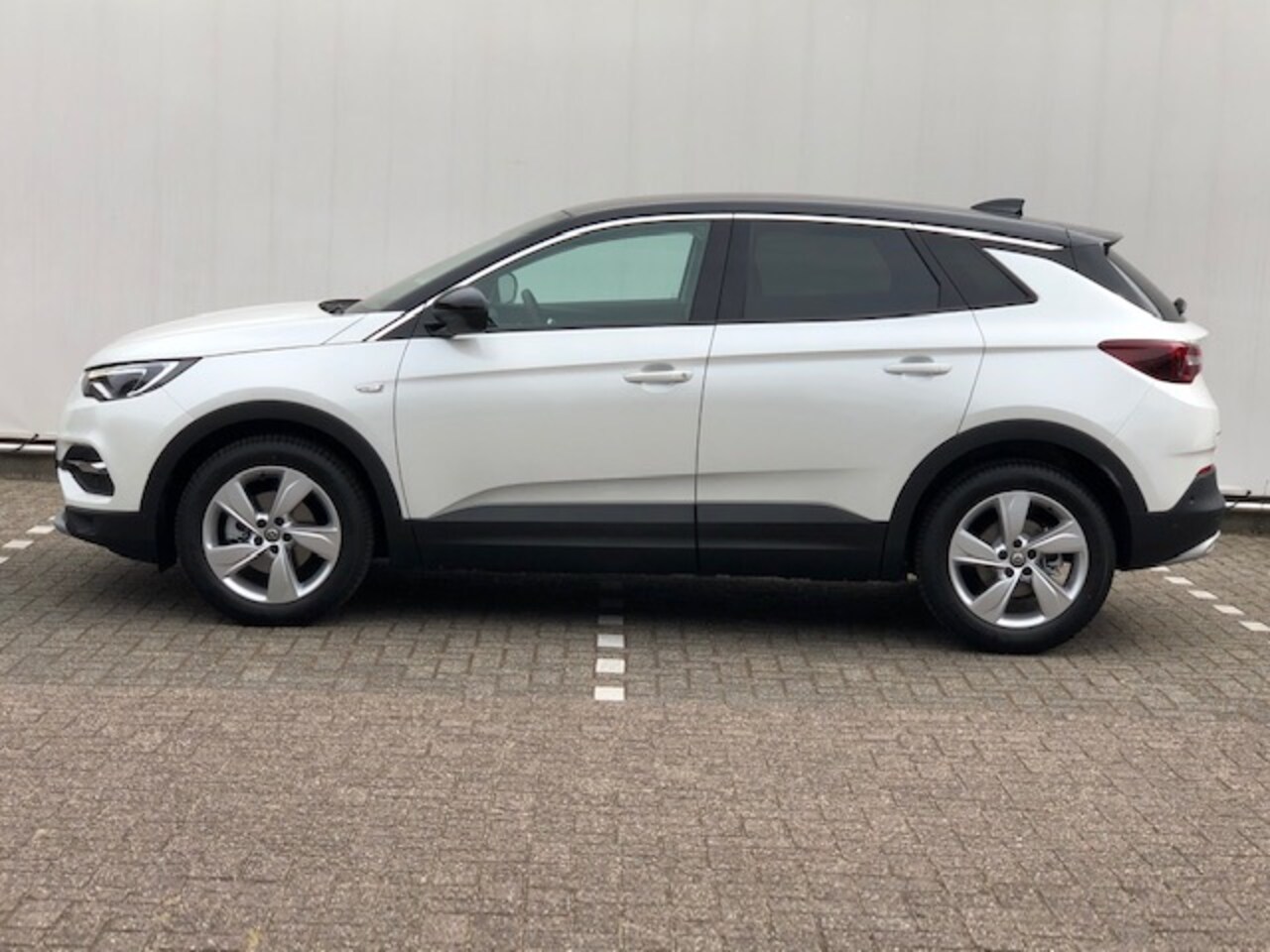 Opel Grandland X - 1.2 Turbo Ultimate Automaat met Panoramadak, Leer, Navi/Camera, Winterpakket, Elek.Klep - AutoWereld.nl