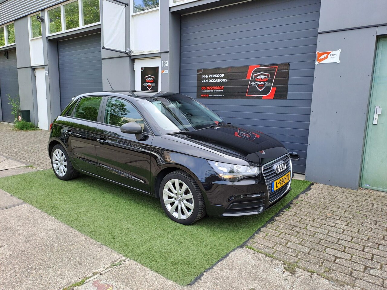 Audi A1 Sportback - 1.2 TFSI Attraction 2013 5DRS PDC NAVI - AutoWereld.nl