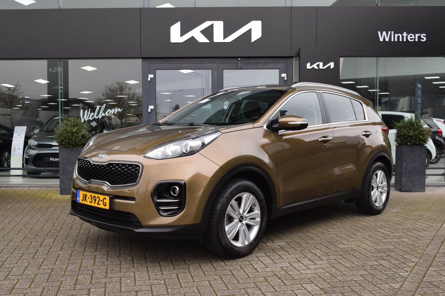 Kia Sportage - 1.6i-16V ISG First Edition ECC-Airco Cr.Control Navi+Camera BT+USB 6-bak 17"LMV Trekhaak - AutoWereld.nl