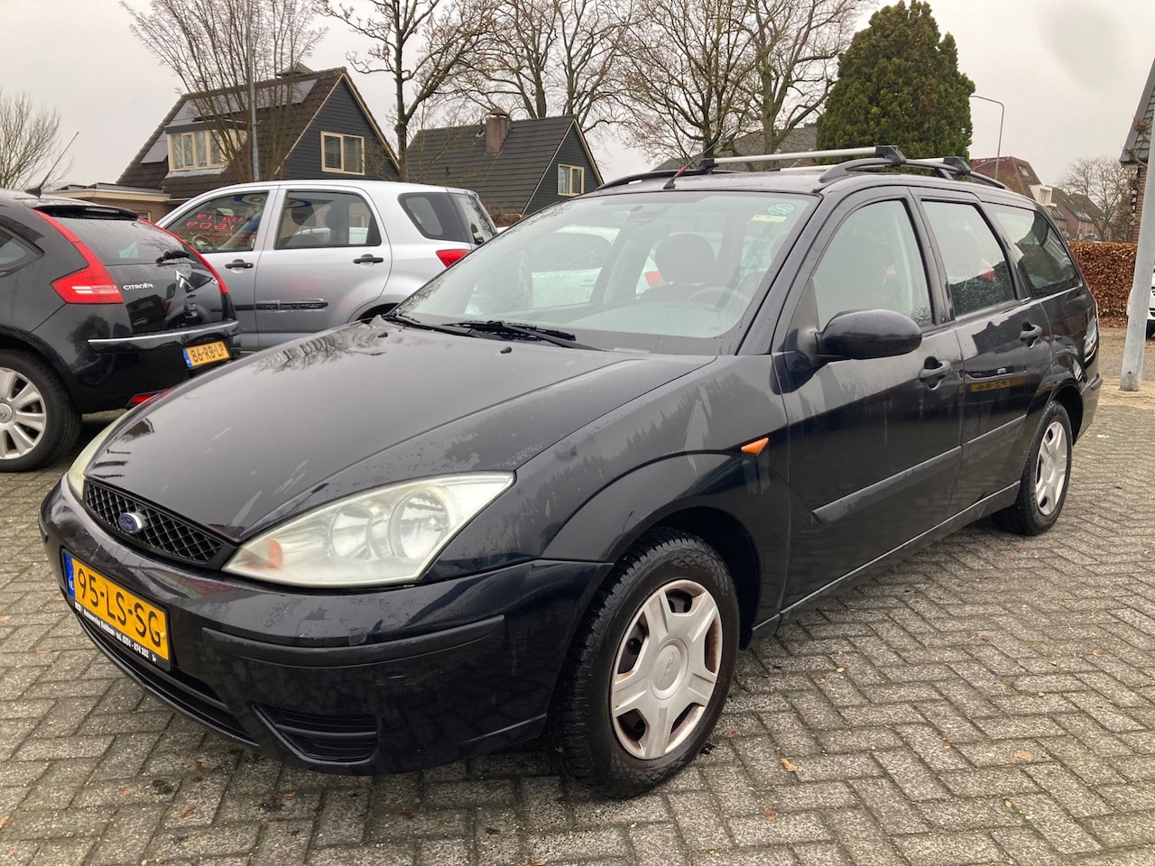 Ford Focus Wagon - 1.6-16V Centennial 74kW-101pk Apk 9/3/25,Airco,Trehaak 999,- - AutoWereld.nl