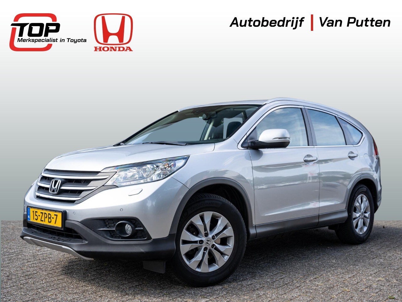 Honda CR-V - 2.0 Elegance | Climate | Cruise | Trekhaak | 1700kg | Dealeronderhouden | All Season bande - AutoWereld.nl