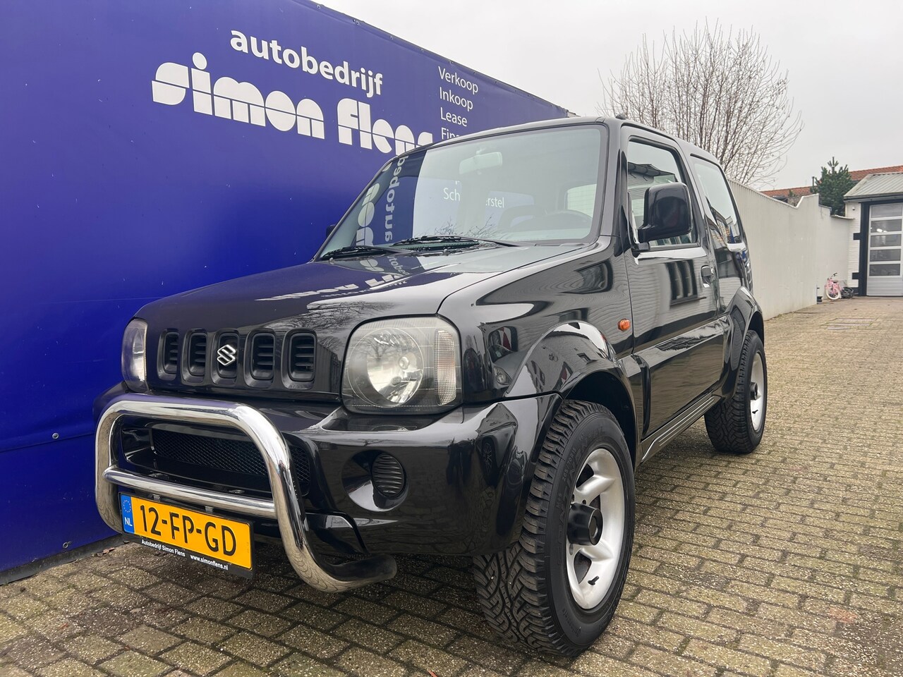 Suzuki Jimny - 1.3 JX 2WD*NETTE AUTO!*AIRCO* - AutoWereld.nl