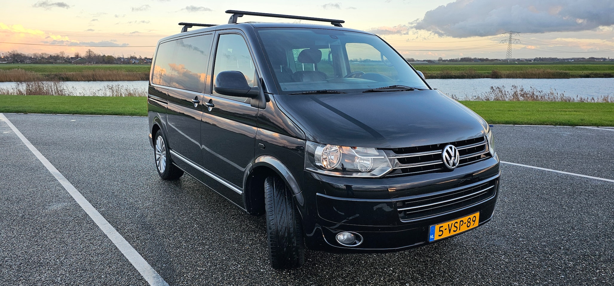 Volkswagen Transporter Multivan - 2.0 TDI L1H1 Highline DC - AutoWereld.nl