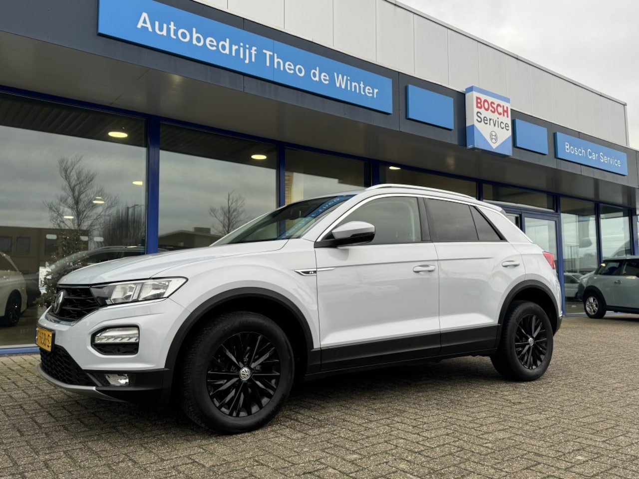 Volkswagen T-Roc - 1.5 TSI Style| R-line, Camera, Clima, Cruise, Apple CarPlay - AutoWereld.nl