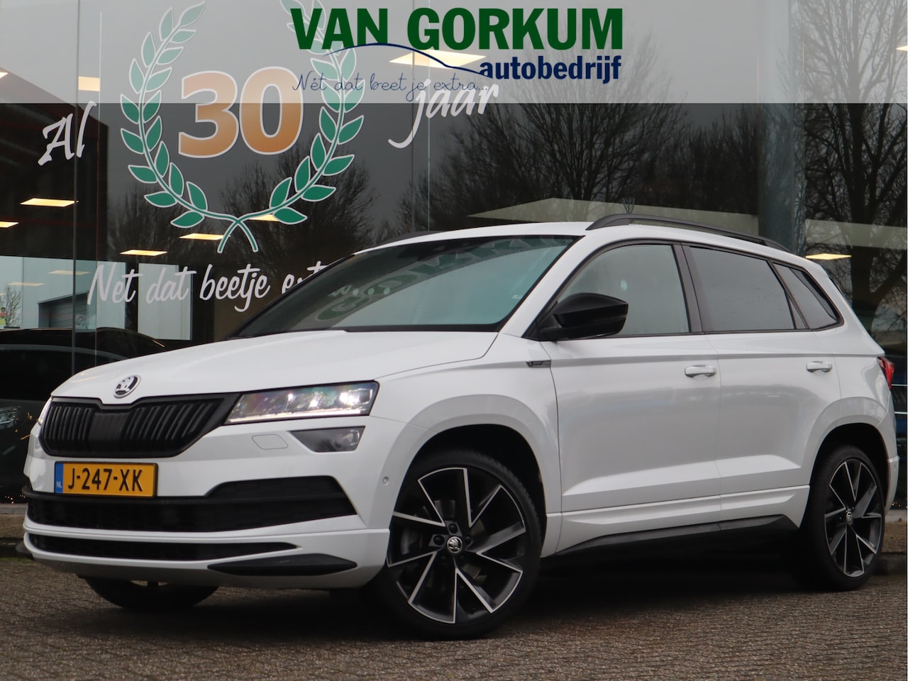 Skoda Karoq - 1.5 TSI ACT Sportline Business Aut / Trekhaak - AutoWereld.nl