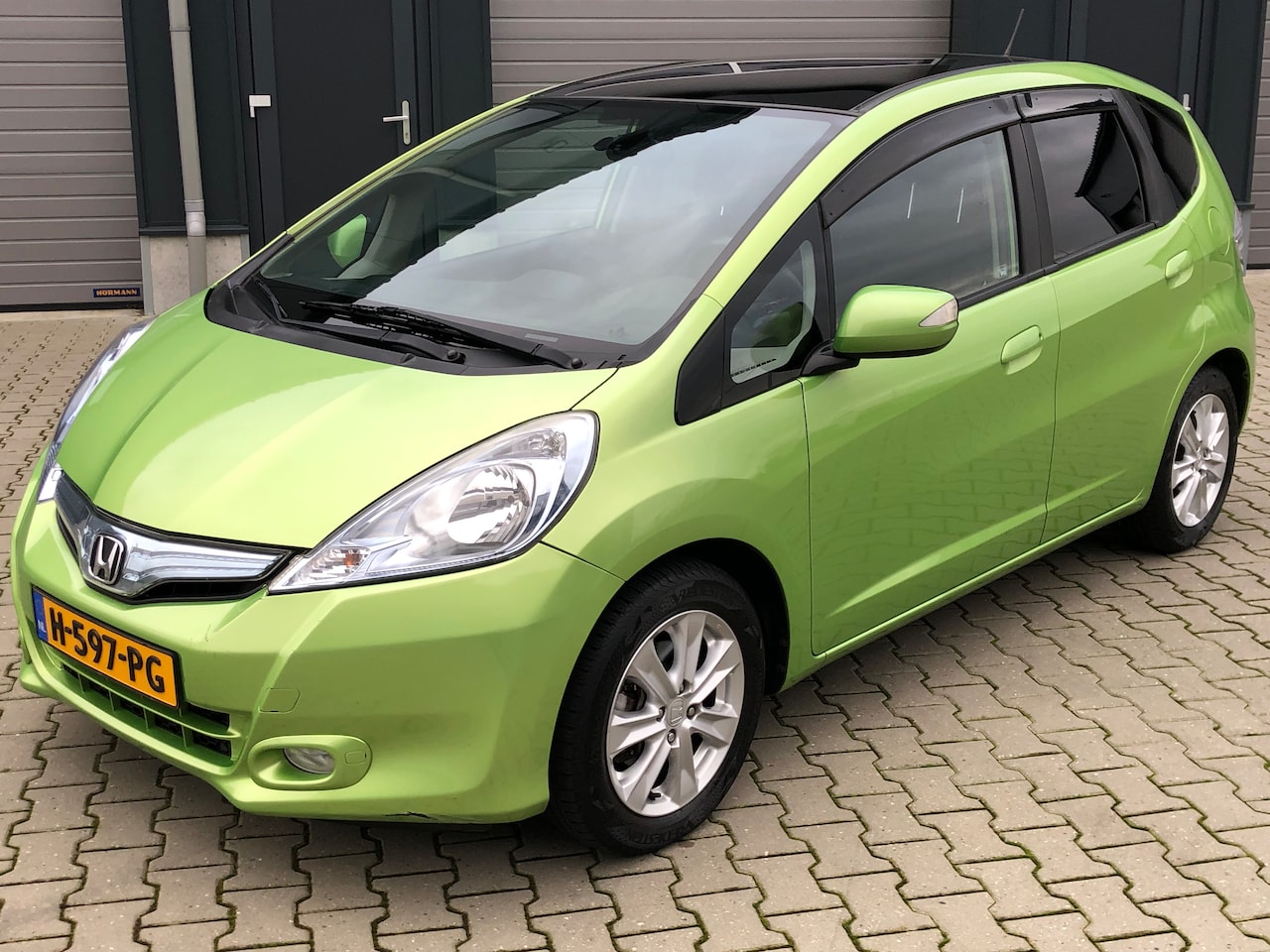 Honda Jazz - 1.4 Hybrid Exclusive Panorama | Camera | Cruise Control | Clima | volledig onderhouden | - AutoWereld.nl