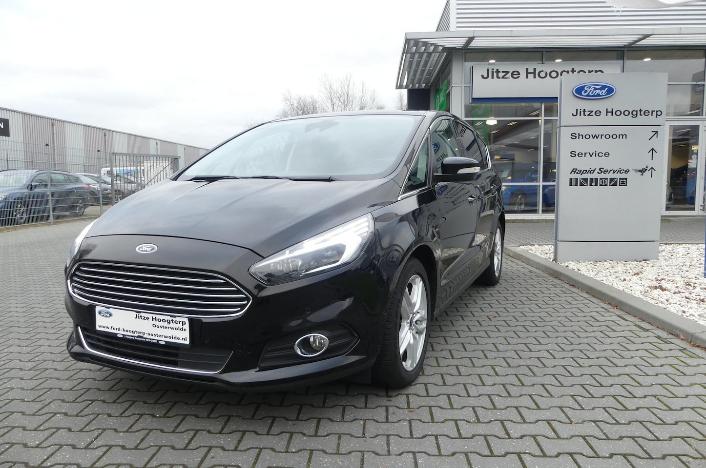 Ford S-Max - 1.5 Titanium 7p. 150PK.7 PERSOONS.NAVI.CAMERA.WINTERPACK.KEYLESS.PANTHER BLACK.67865KM. - AutoWereld.nl