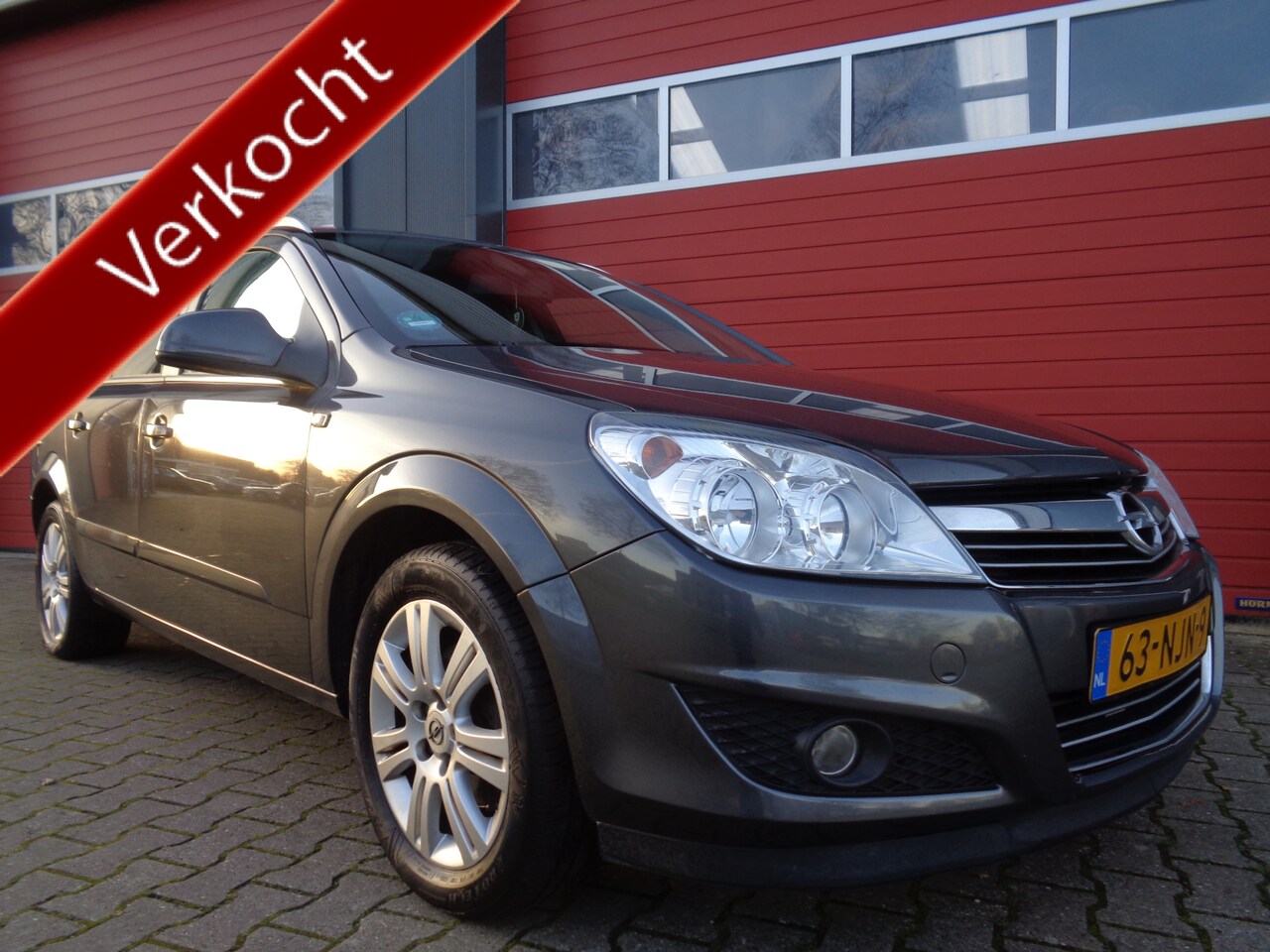 Opel Astra Wagon - 1.6 Cosmo 116PK Clima Cruise LEER LMV Trekhaak NL-Auto - AutoWereld.nl