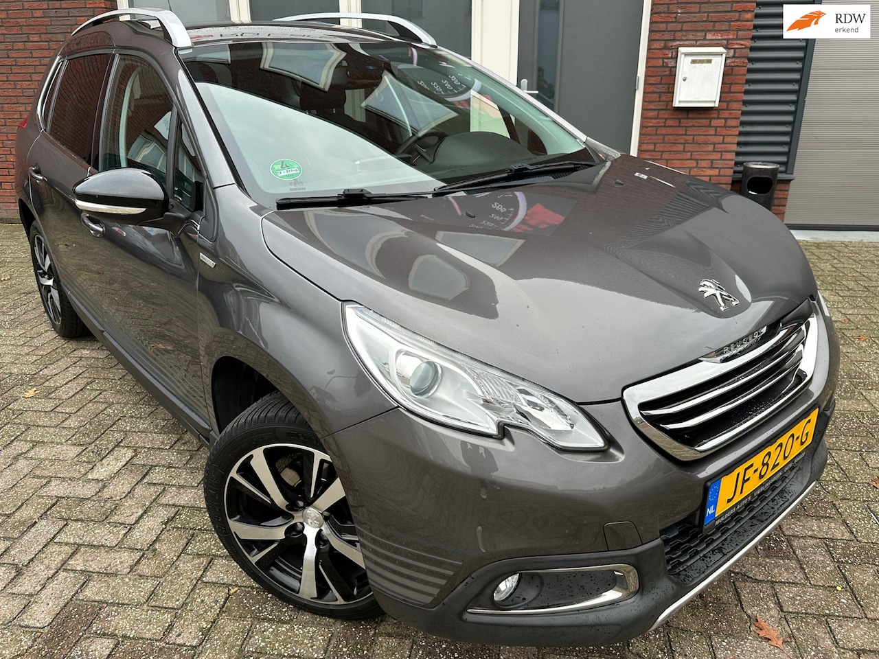 Peugeot 2008 - 1.2 PureTech Urban Cross / Navi / Cruise / NAP - AutoWereld.nl