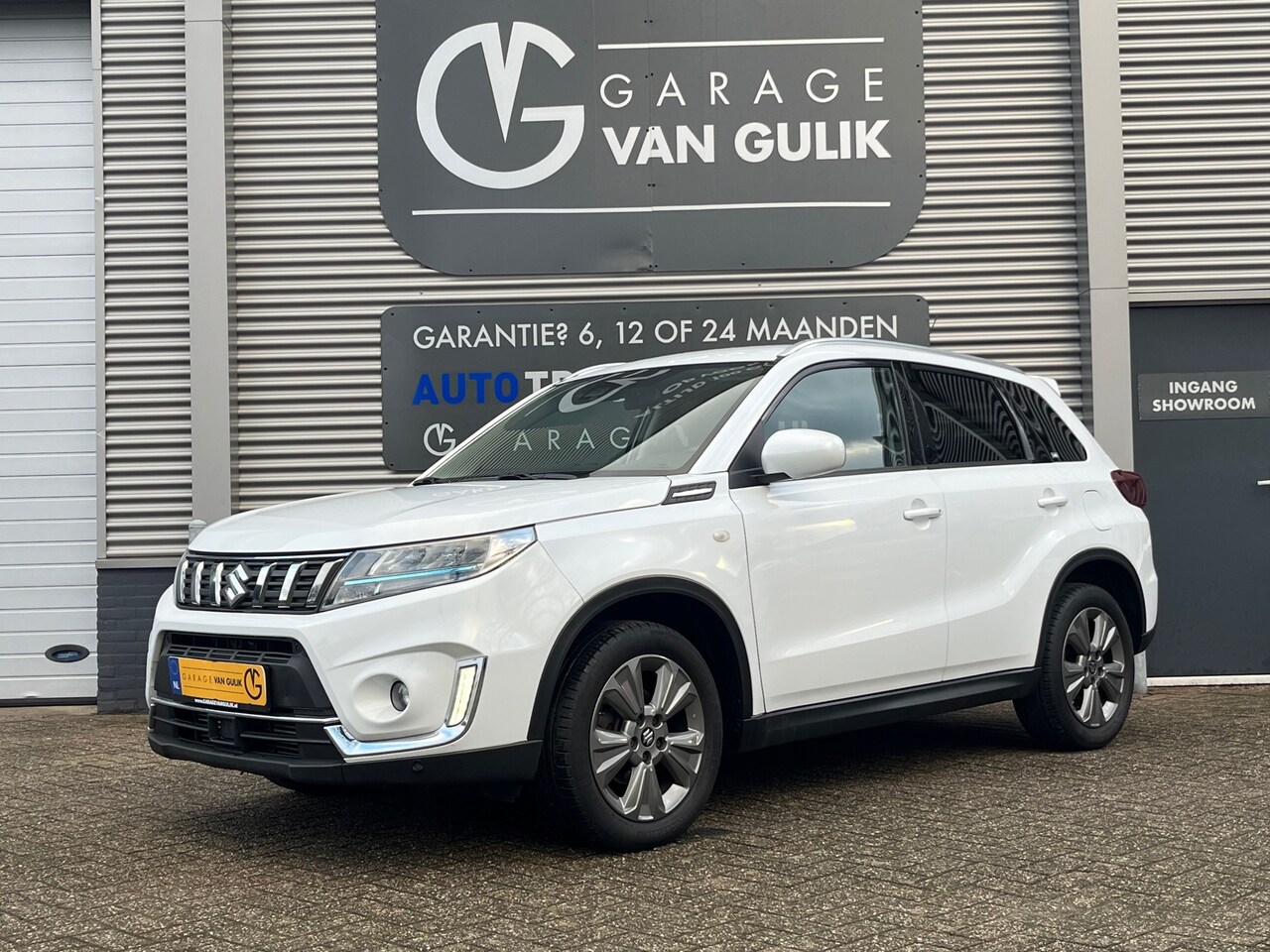 Suzuki Vitara - 1.4 129PK Hybrid Boosterjet AllGrip Clima,Cruise,Navi,Trekhaak,Stoelverw.,LaneAssist,Camer - AutoWereld.nl