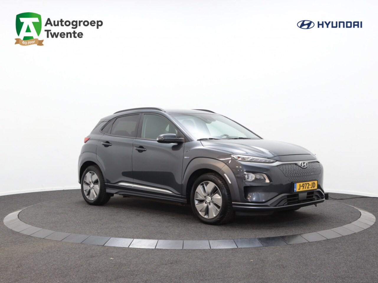 Hyundai Kona Electric - EV Premium 64 kWh | Leer | Navigatie | Camera | Carplay | - AutoWereld.nl