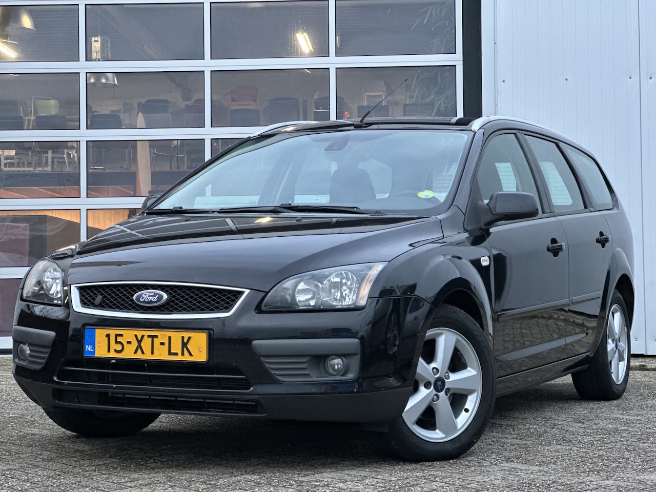 Ford Focus Wagon - 1.8-16V Futura Flexifuel 126pk | Airco | Cruise Control | Navigatie | Stoelverwarming | Vo - AutoWereld.nl