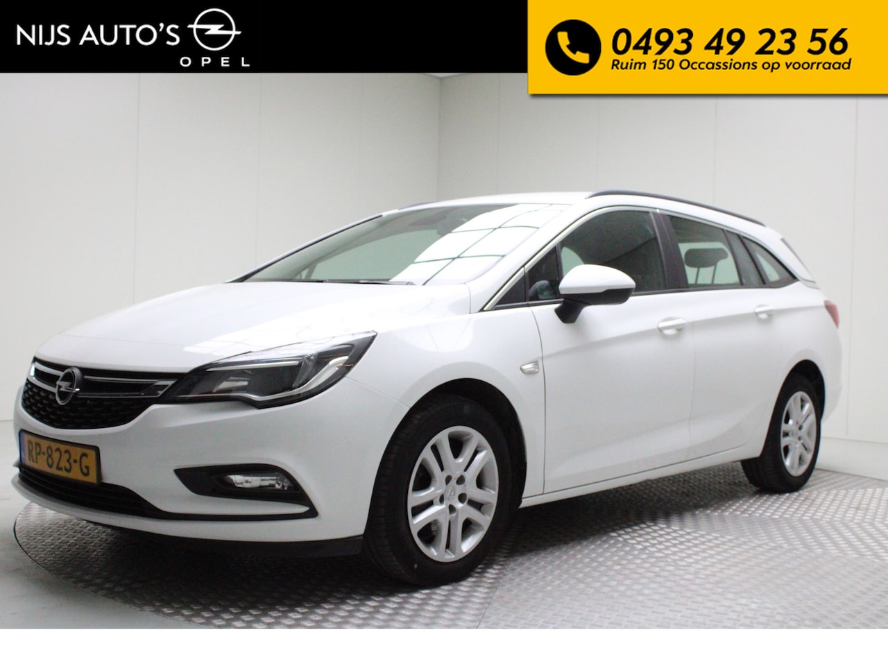 Opel Astra Sports Tourer - 1.6 CDTI Business+ | Trekhaak | Airco | Cruise | Carplay | Navi full map | PDC achter | bl - AutoWereld.nl