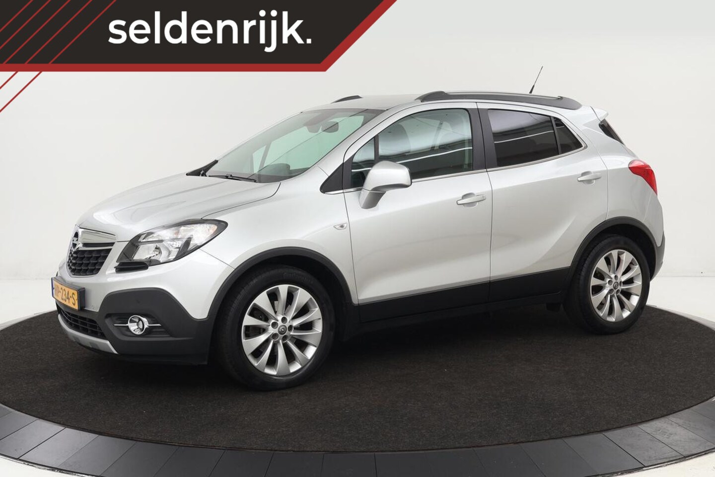 Opel Mokka - 1.4 Turbo Cosmo | Trekhaak | Camera | Climate control | Half leder | Bluetooth | Cruise co - AutoWereld.nl