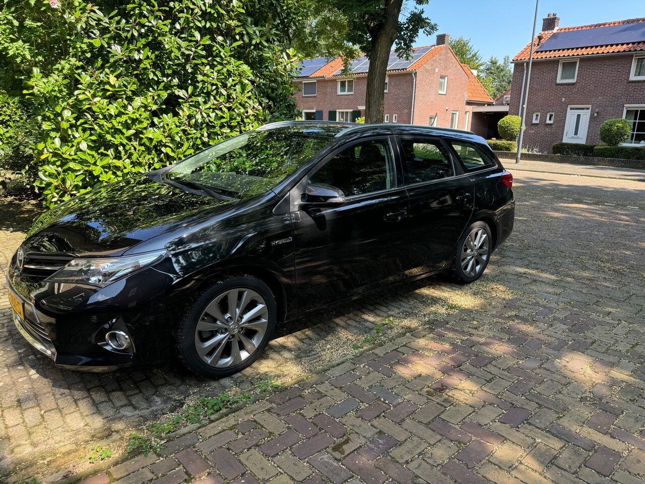 Toyota Auris Touring Sports - 1.8 Hybrid Executive - AutoWereld.nl