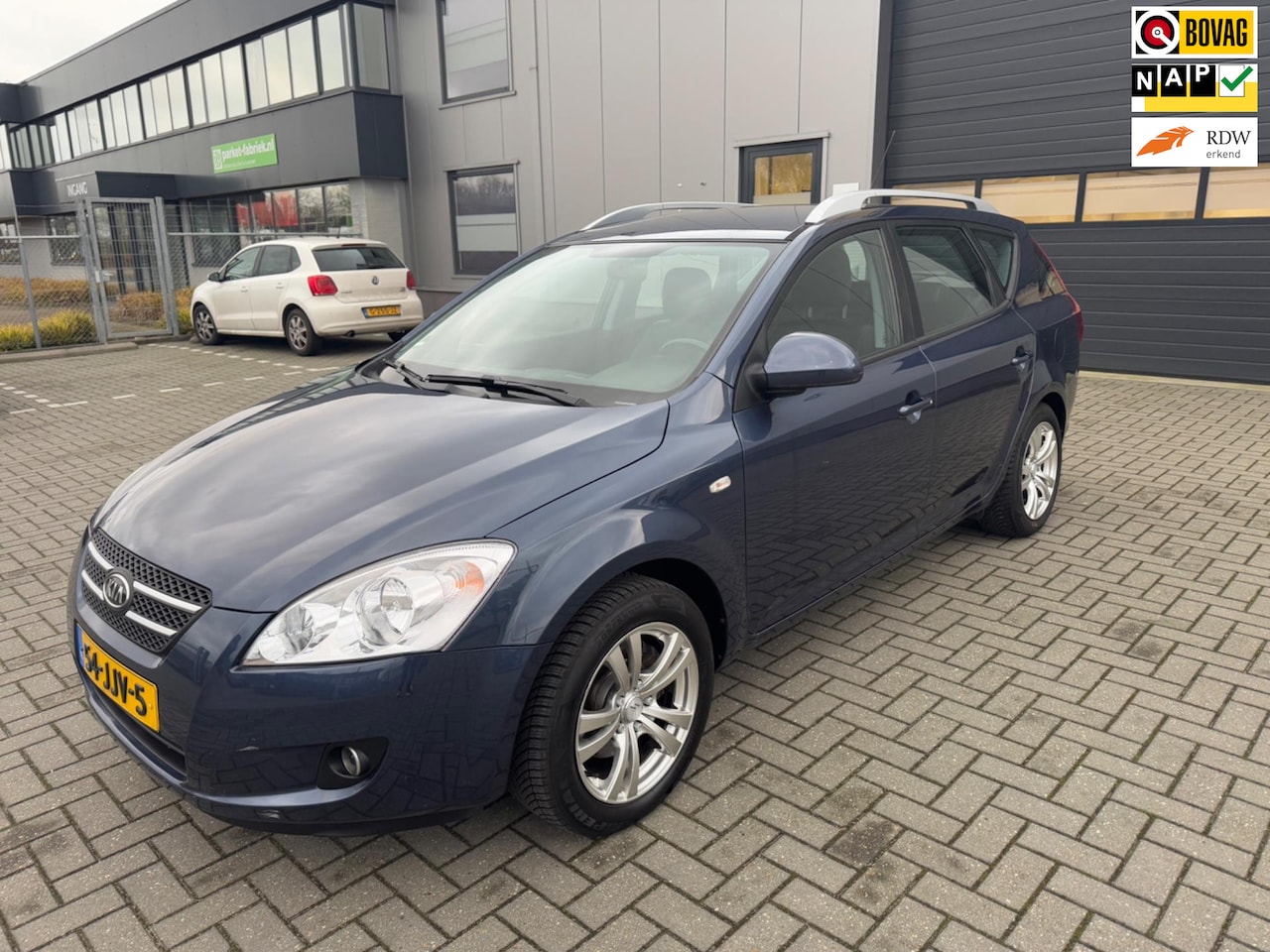 Kia Cee'd Sporty Wagon - 1.4 X-ecutive ISG 1.4 X-ecutive ISG - AutoWereld.nl