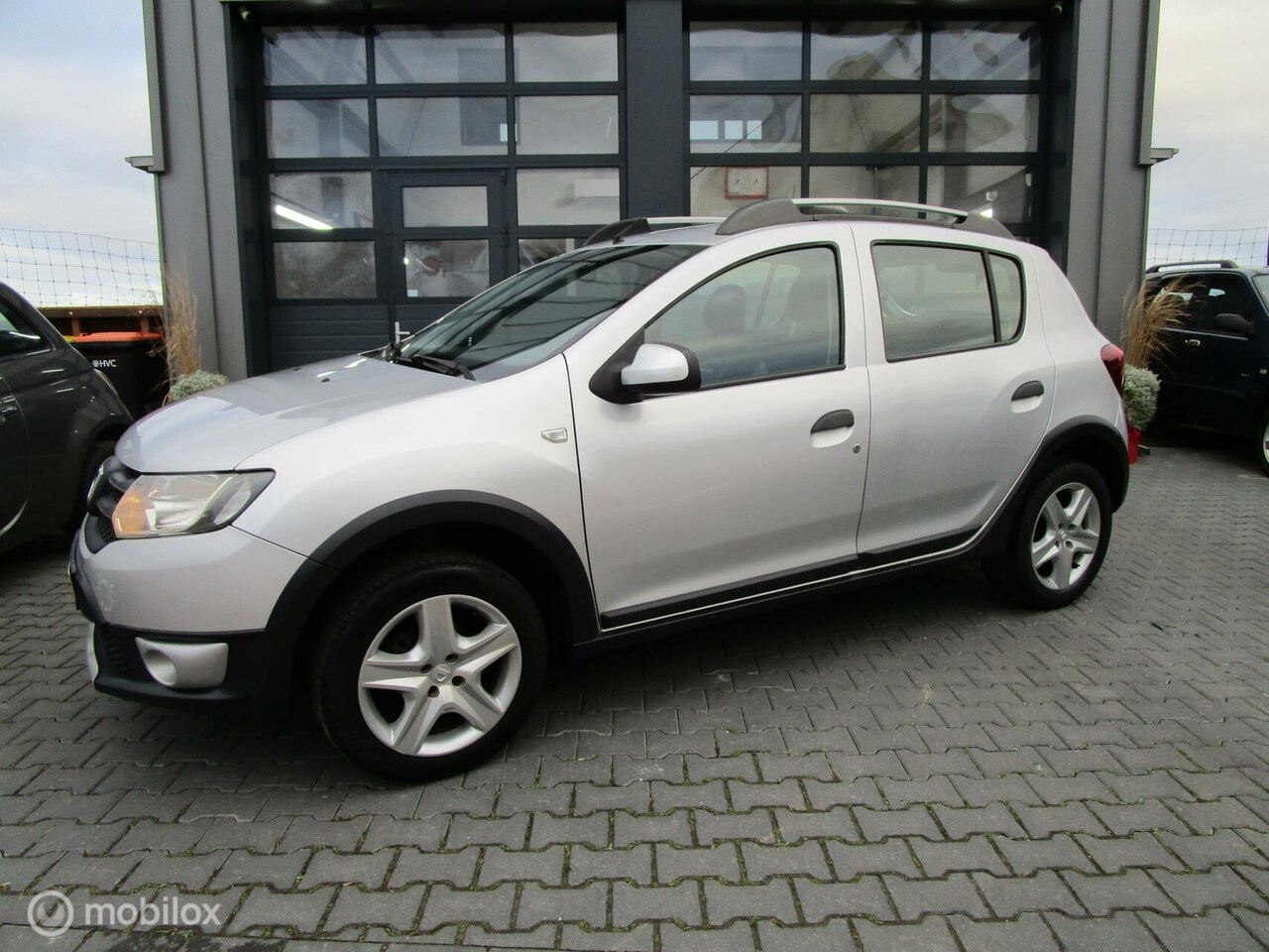 Dacia Sandero Stepway - 0.9 TCe Lauréate 143dkm Airco Cruise Trekhaak - AutoWereld.nl