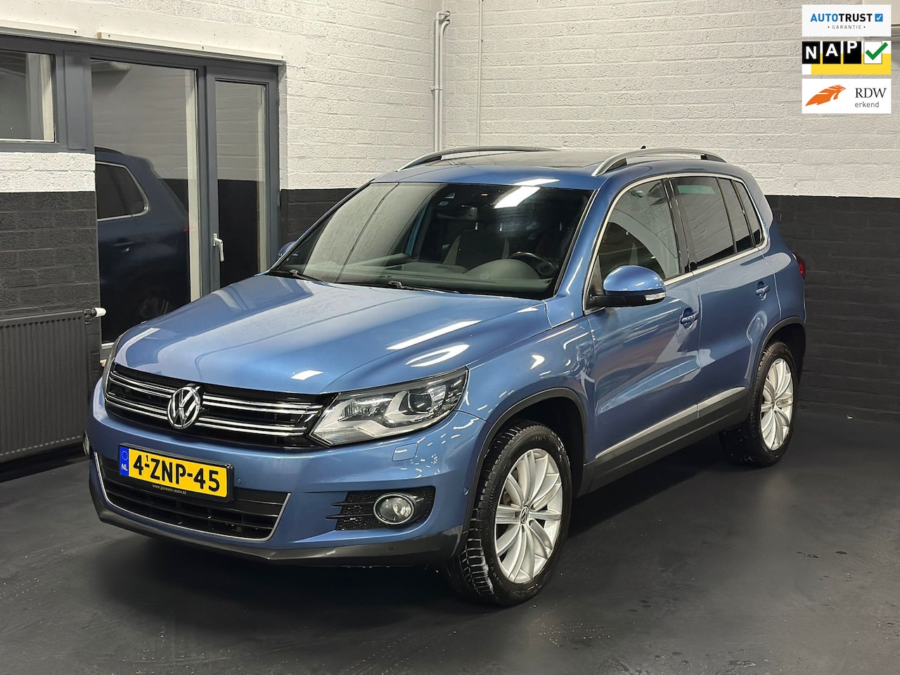 Volkswagen Tiguan - 2.0 TSI Sport&Style 4motion R-line Edition, Navi, Pano, Camera, Dynaudio, DSG, - AutoWereld.nl