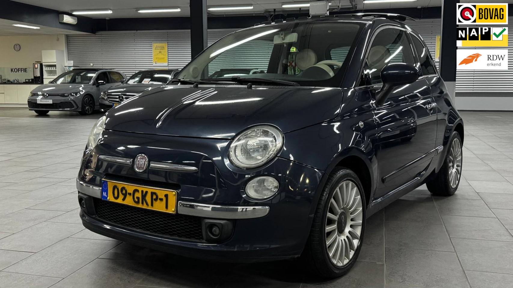 Fiat 500 - 1.2 Lounge panoramadak airco elektrische pakket lm-velgen nl-auto - AutoWereld.nl