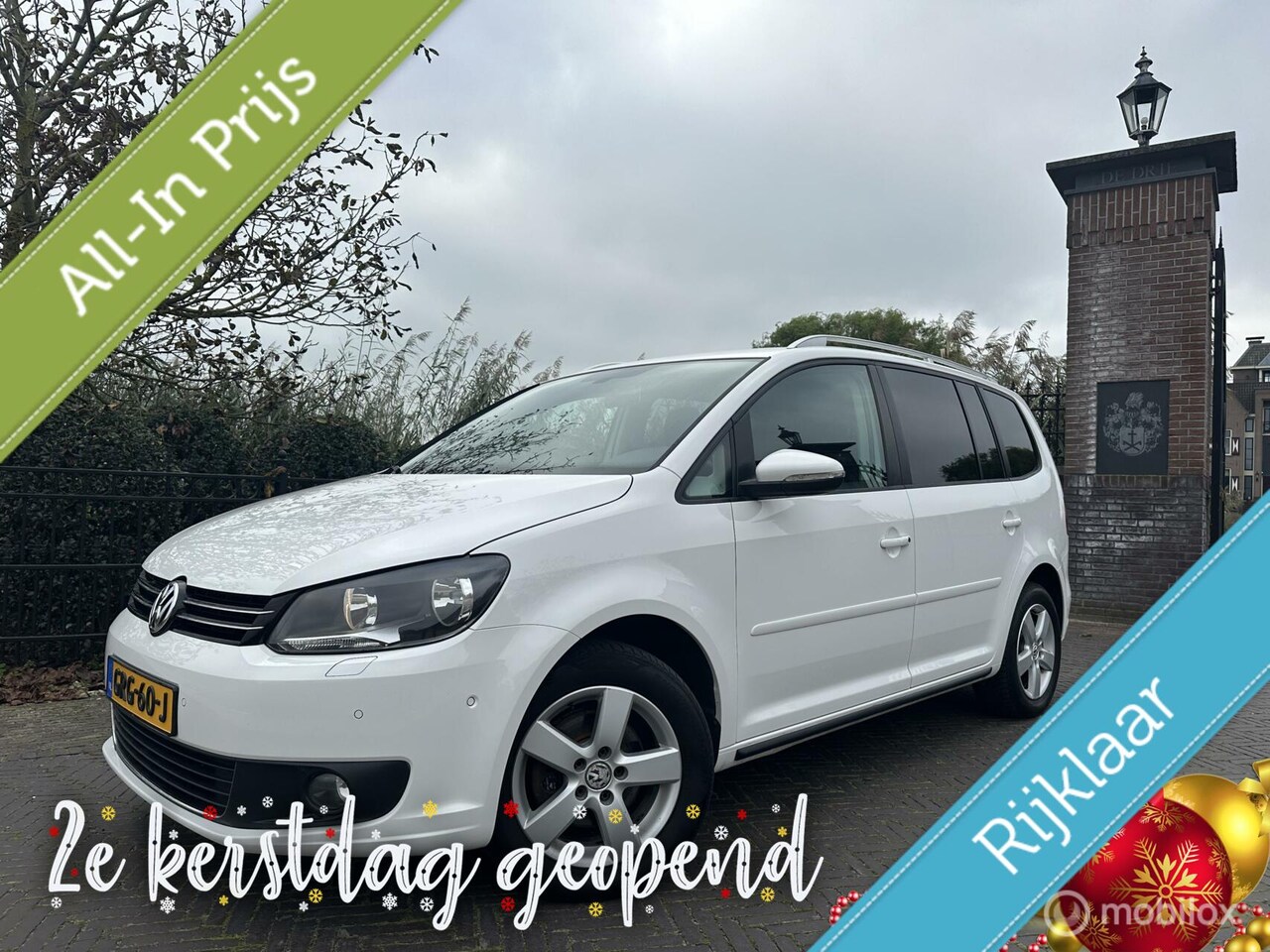 Volkswagen Touran - 1.4TSI DSG 7-personen Trekhaak Navi Cruise - AutoWereld.nl