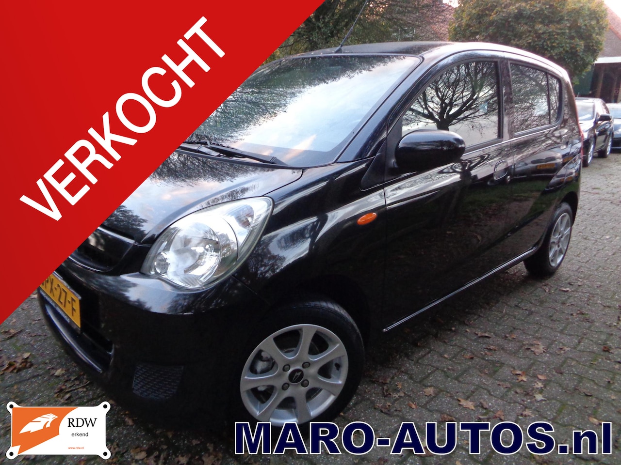 Daihatsu Cuore - 1.0 Comfort Airco | LM wielen | Model 2011 | Boekjes | RIJKLAAR| - AutoWereld.nl