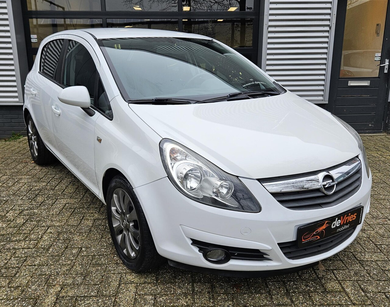 Opel Corsa - 1.2-16V Enjoy **5DRS-AIRCO-APK** - AutoWereld.nl