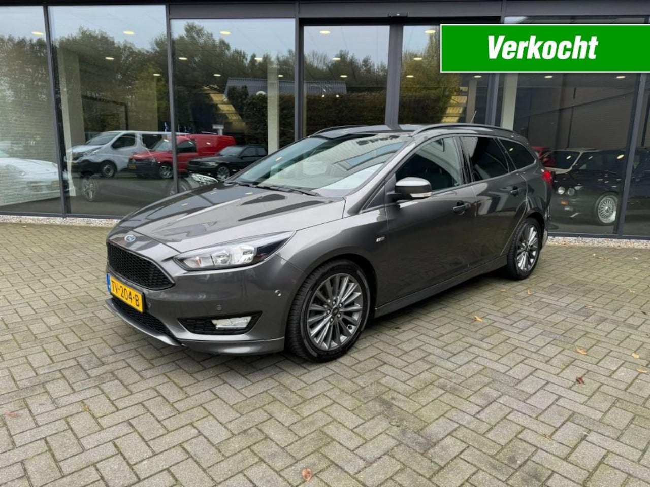 Ford Focus Wagon - 1.0 ST-Line Wagon 1.0 ST-Line,Winterpack,Carplay,Navi,Clima,Cruise,PDC,Trekh - AutoWereld.nl