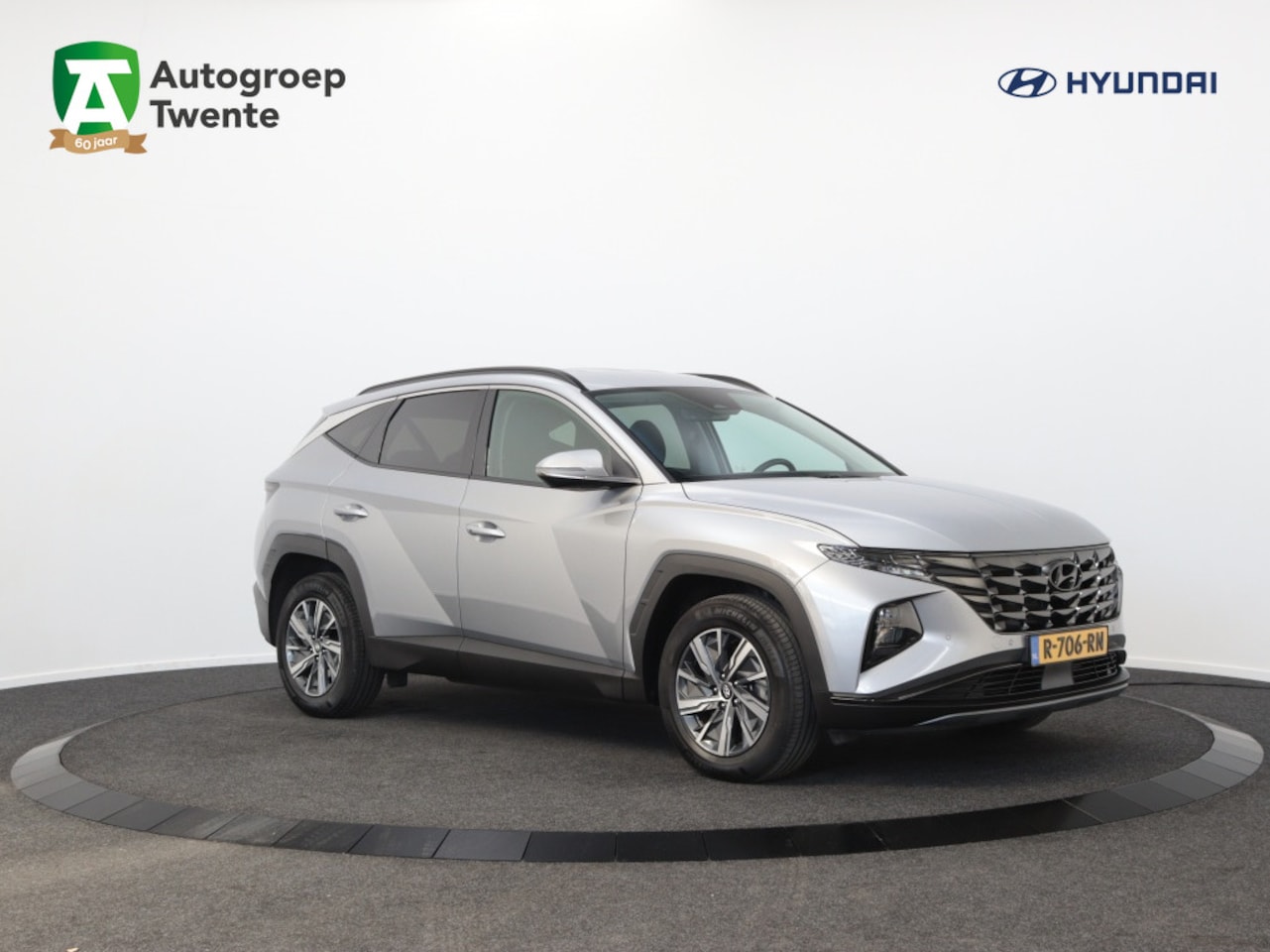 Hyundai Tucson - 1.6 T-GDI HEV Comfort Smart Hybride | Airco | Navigatie | Carpla - AutoWereld.nl