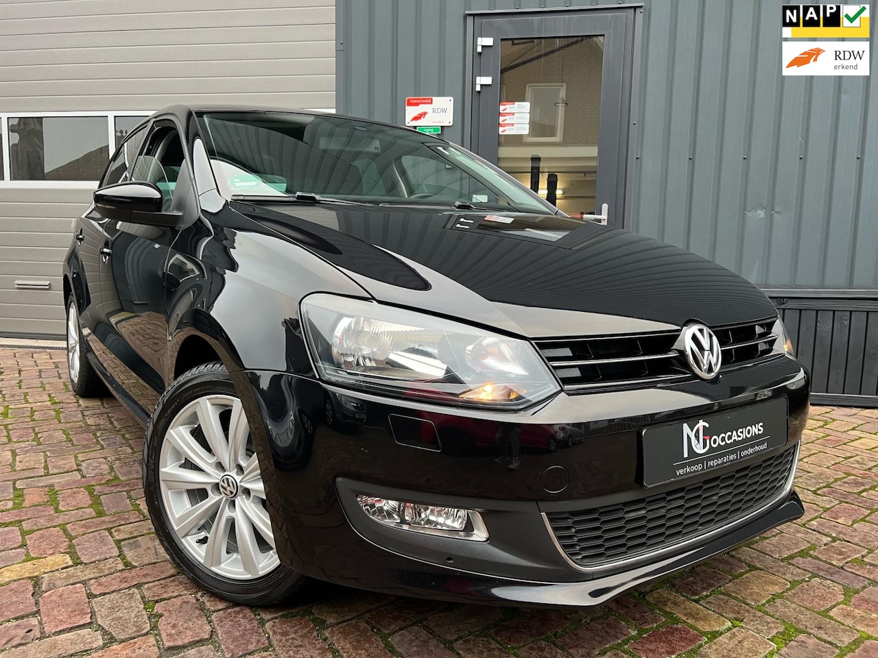 Volkswagen Polo - 1.2 Style Cruise / Clima / PDC - AutoWereld.nl