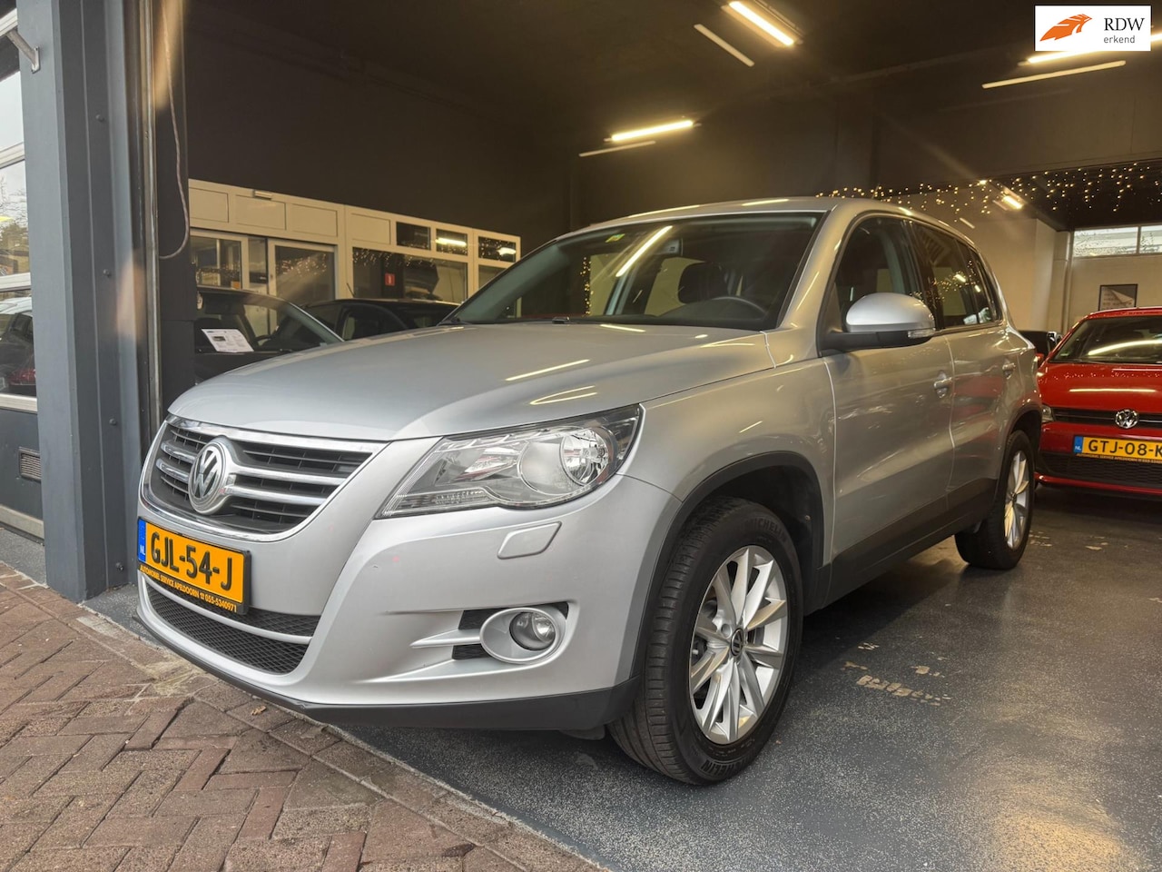 Volkswagen Tiguan - 1.4 TSI Sport&Style*PDC*STOELVERW*LMV*ONDBOEKJES* - AutoWereld.nl