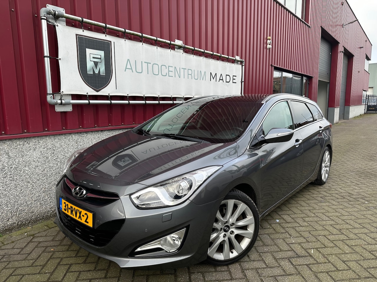 Hyundai i40 Wagon - 2.0 GDI i-Catcher // Automaat // Navi // Pano.dak // PDC // Leder // Trekhaak - AutoWereld.nl