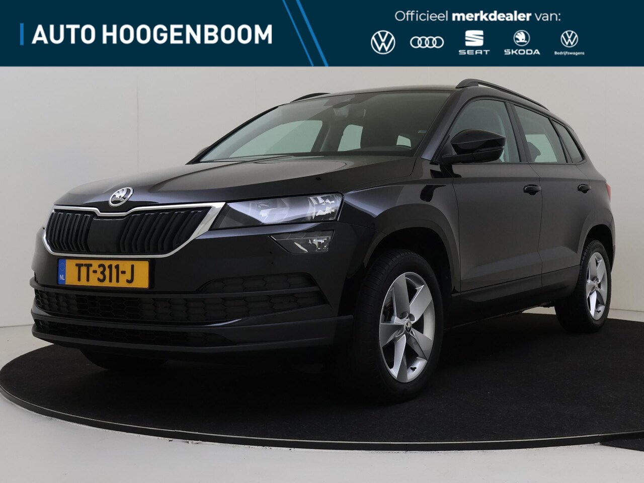 Skoda Karoq - 1.0 TSI Ambition | Achteruitrijcamera | Keyless | Stoelverwarming | Dodehoek detectie | Na - AutoWereld.nl